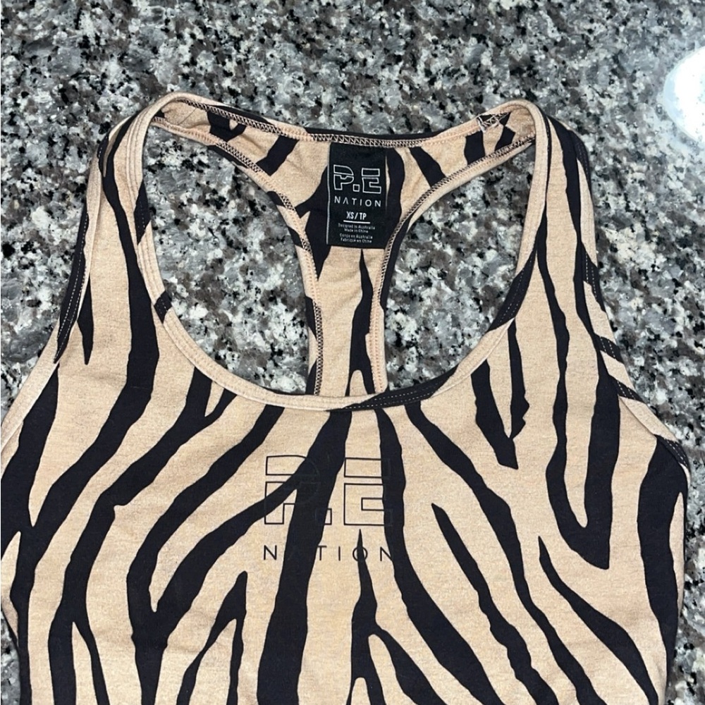 Zebra print sports bra! No tags but never worn! 🤎🖤